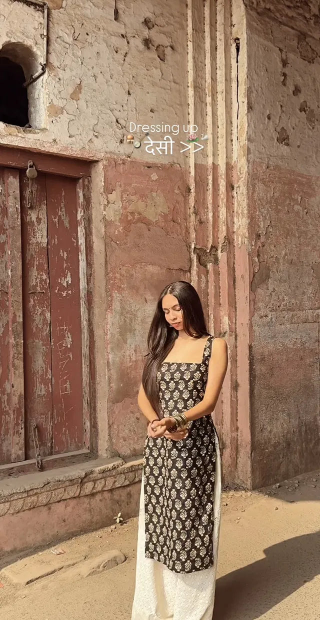 মহিলাদের প্রিন্টেড স্ট্রেইট স্লিভলেস কুর্তা