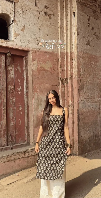 মহিলাদের প্রিন্টেড স্ট্রেইট স্লিভলেস কুর্তা